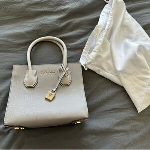 Marc Jacobs, small clutch. Brand new with duster bag.